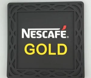 Tappetino per tazza da caffè Nescafé quadrato in PVC morbido fantasia